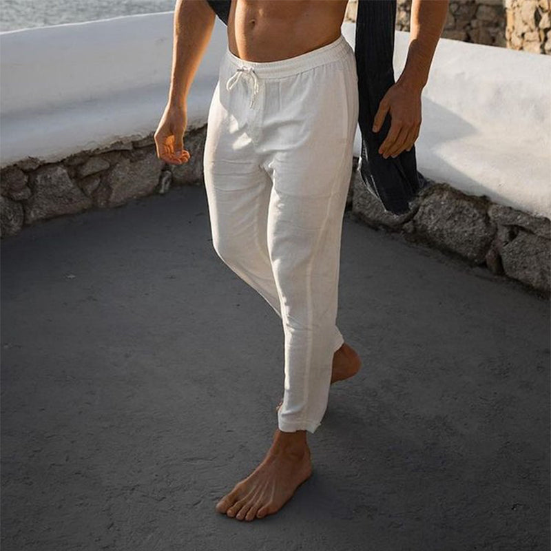 Detalle de tejido de lino de pantalones para hombre. Textura fresca, transpirable y estilo casual de verano.