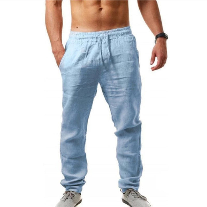 Pantalones de lino de hombre, combinando estilo relajado con elegancia y confort transpirable para el verano.