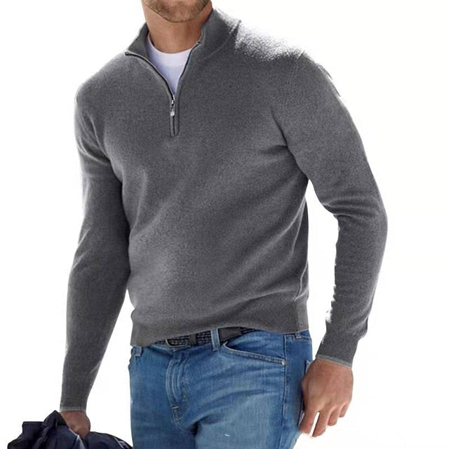 Suéter de manga larga para hombre, con media cremallera para un look casual y moderno. Tejido suave.
