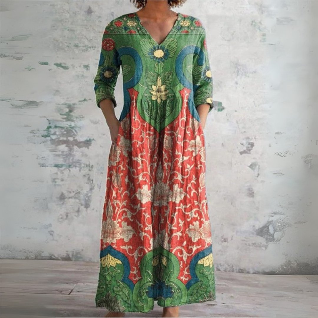 Vestido largo bohemio para mujer con escote V y estampado floral. Estilo étnico, ideal para verano casual.