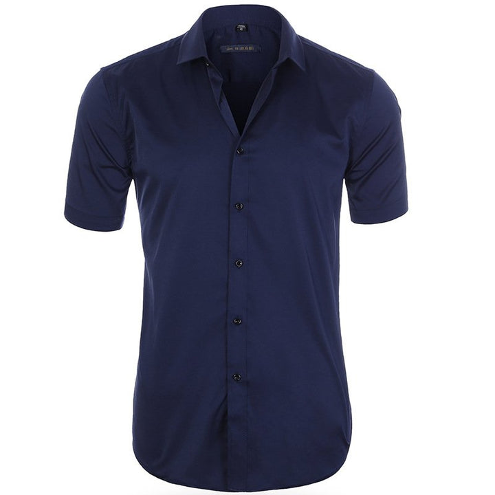 Camisa entallada de hombre, manga corta. Imprescindible para un guardarropa de verano fresco y con estilo.