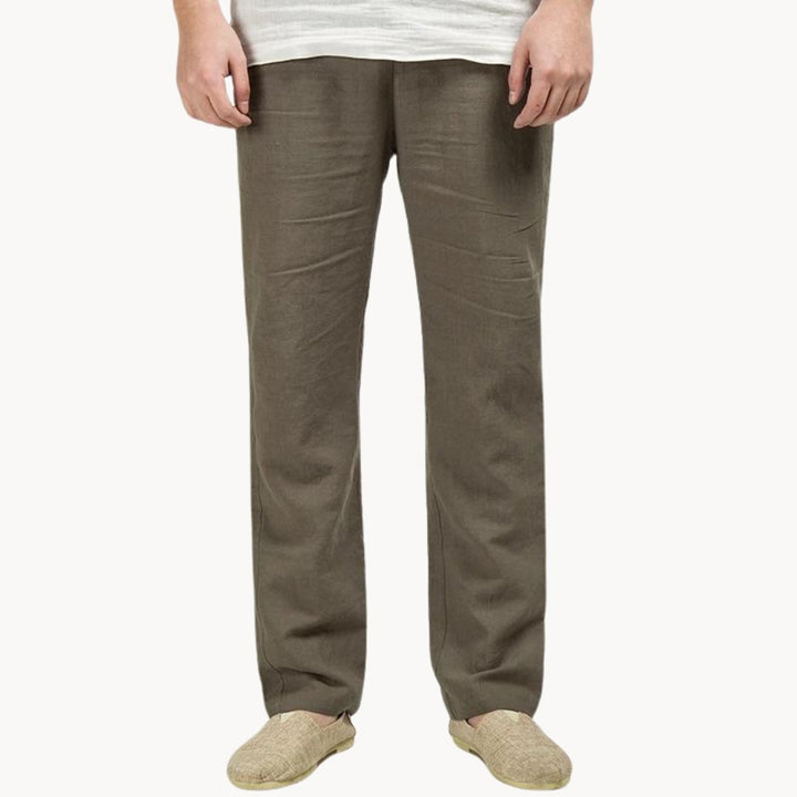 Pantalones de hombre corte recto, cintura elástica. Versátiles y frescos para ocio, ideales para el día a día.