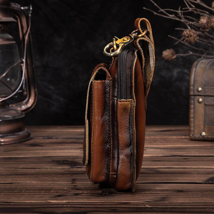 Bolso riñonera de cuero sintético, color café, moda hombre urbana, funcional y con estilo.