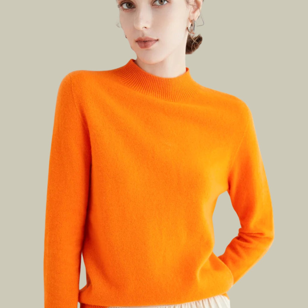 Jersey casual de lana merina, cuello alto para mujer, cómodo y moderno.
