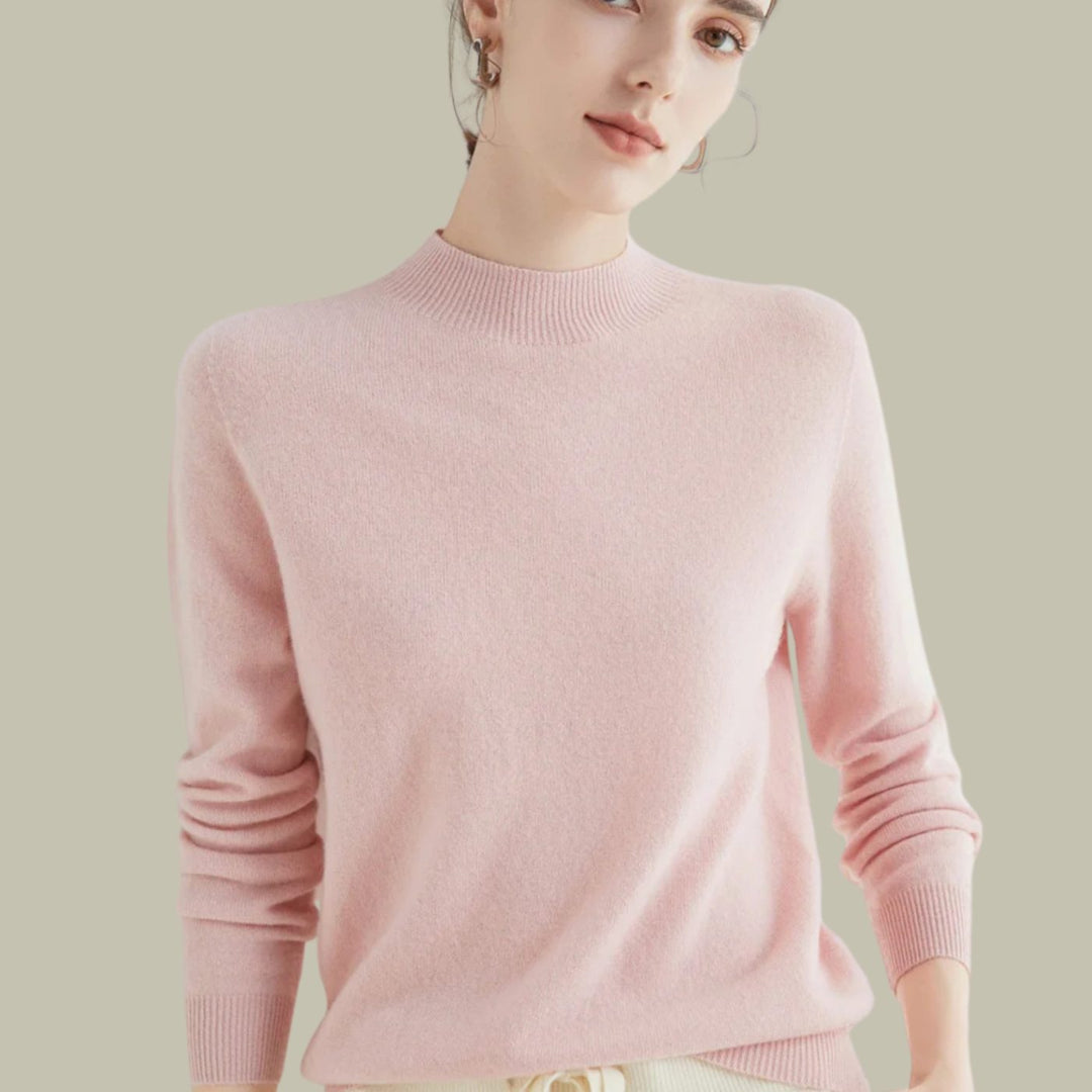 Jersey de lana merina, cuello alto, suave textura, ideal para outfits de otoño.