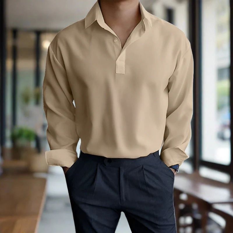 Camisa masculina versátil de manga larga, cuello clásico, perfecta para looks casuales o formales. Moda primavera-verano.