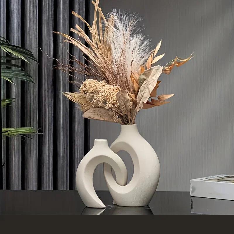 Set de jarrones de cerámica decorativos, diseño minimalista ideal para cualquier rincón del hogar.