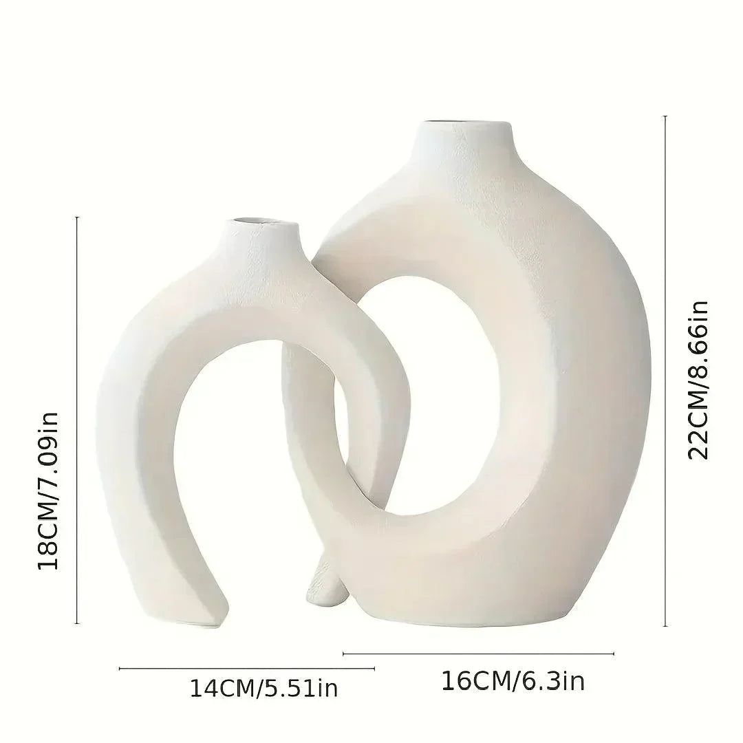 Jarrones de cerámica minimalistas, perfectos para embellecer la sala, comedor o dormitorio del hogar.