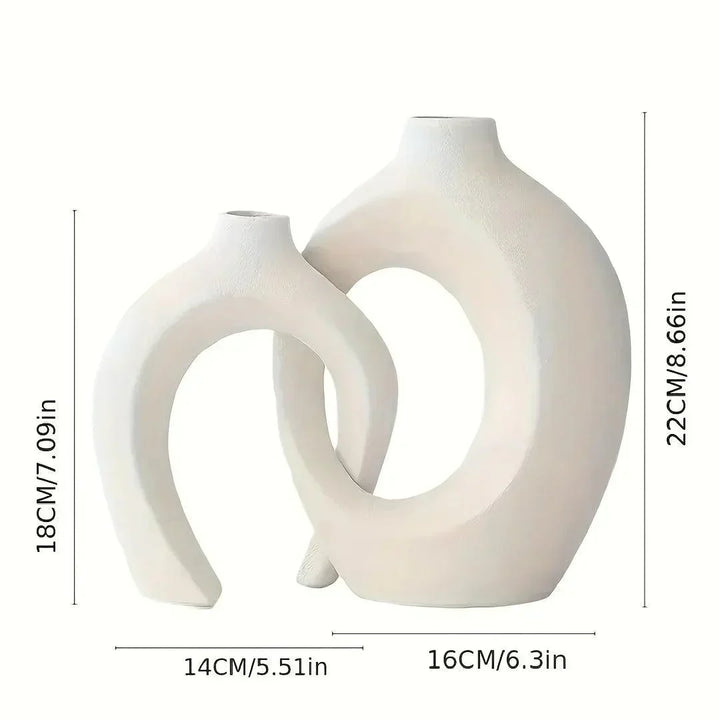 Jarrones de cerámica minimalistas, perfectos para embellecer la sala, comedor o dormitorio del hogar.