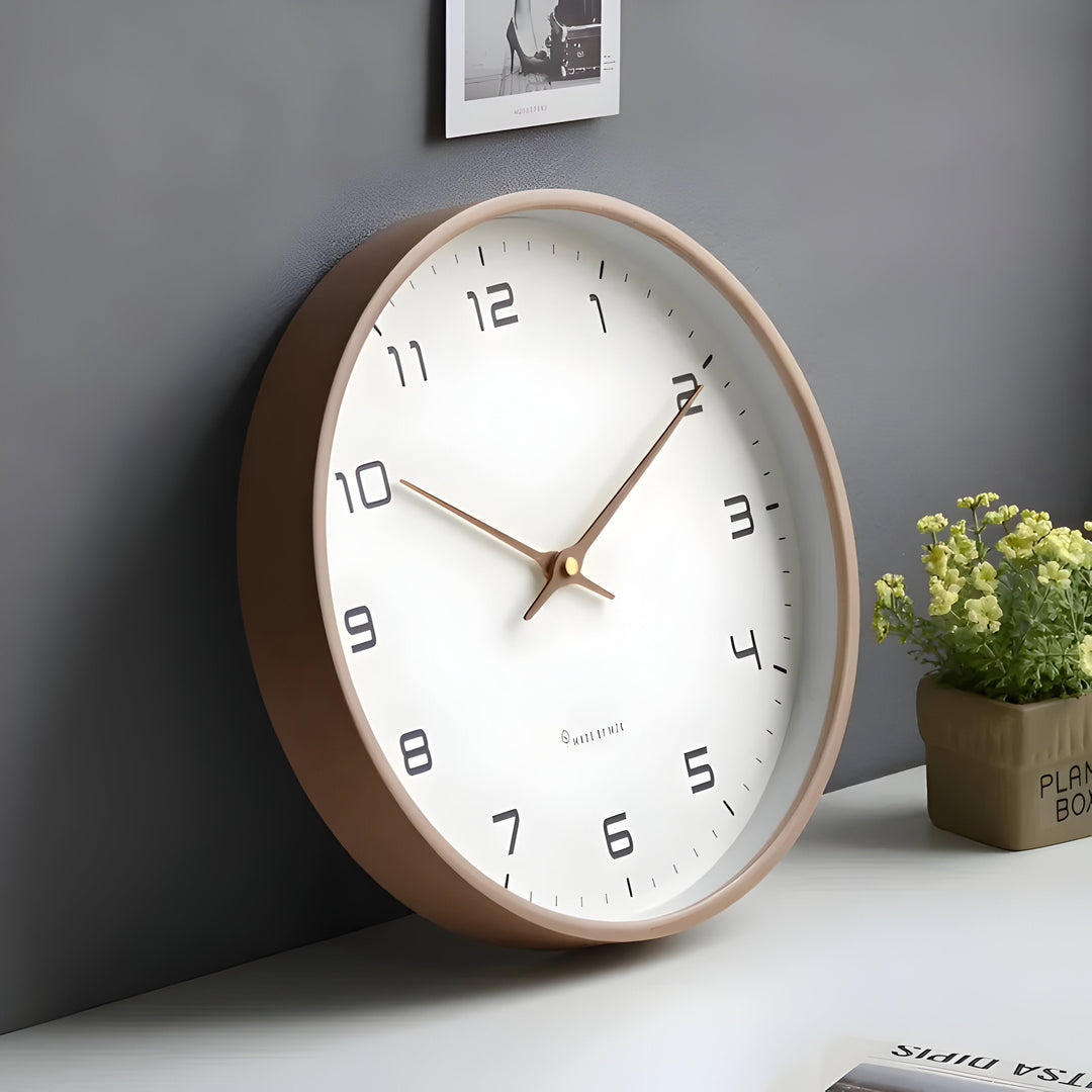 Reloj de pared silencioso para dormitorio. Diseño redondo moderno que complementa la decoración del hogar.