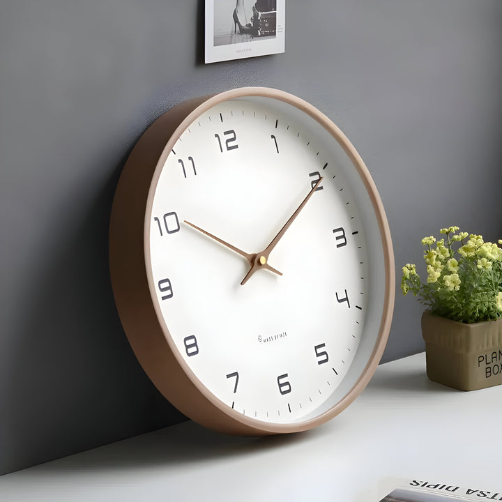 Reloj de pared silencioso para dormitorio. Diseño redondo moderno que complementa la decoración del hogar.