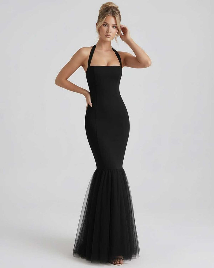 Vestido maxi negro de mujer, con cuello halter y espalda abierta, ideal para noche y eventos glamurosos.