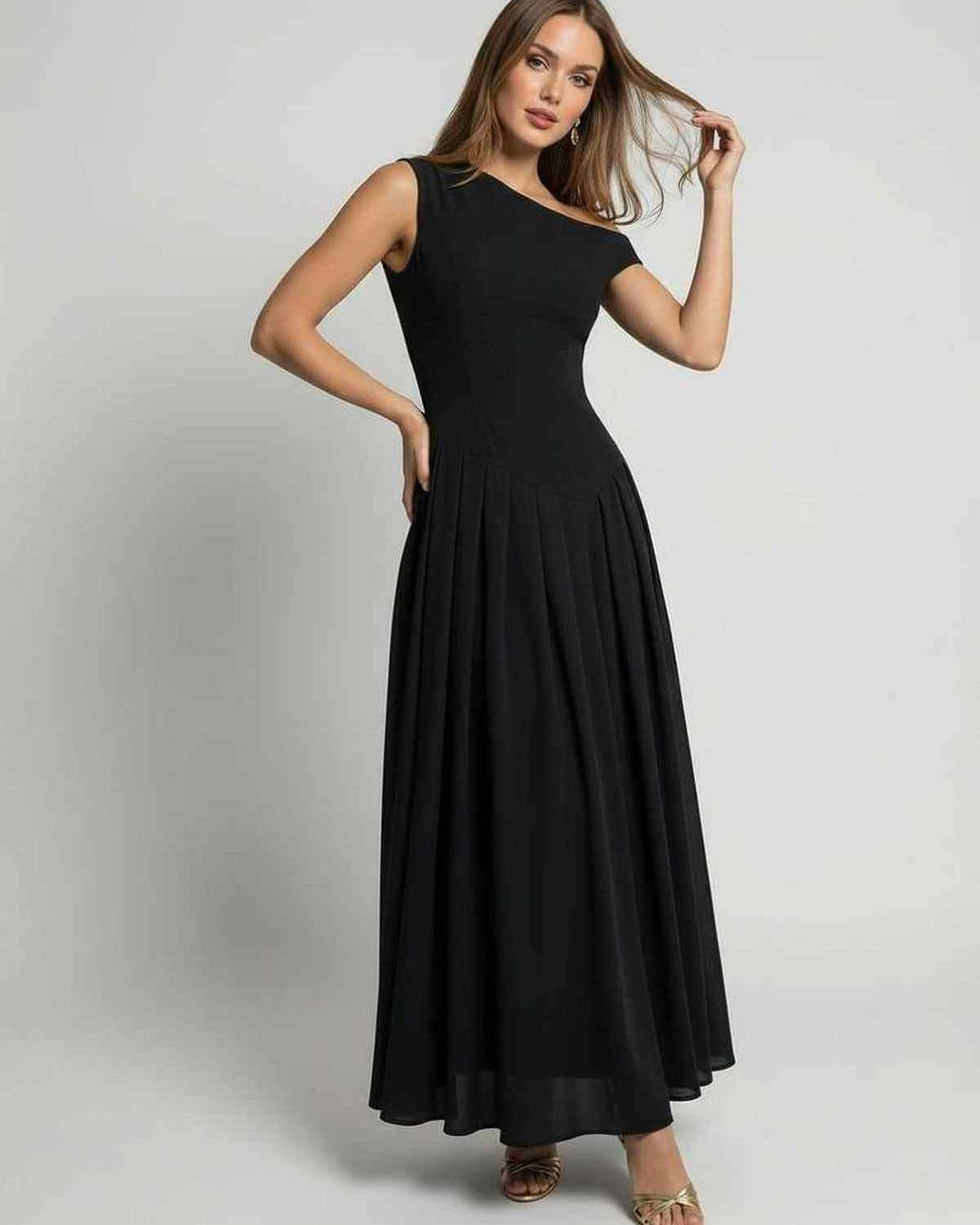 Vestido de noche maxi negro para mujer, con un hombro, estilo elegante y fluido, ideal para eventos formales.