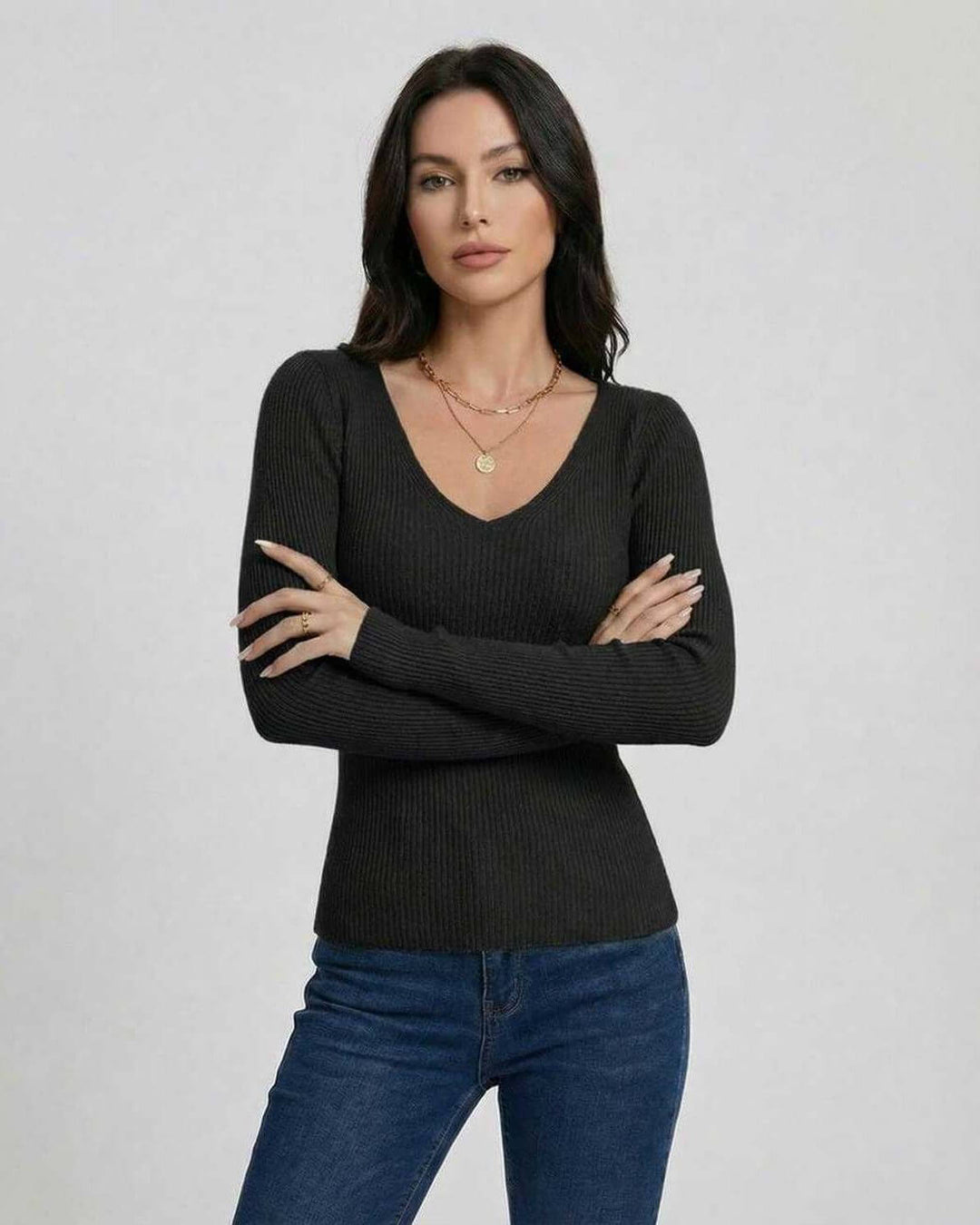 Suéter elegante de mujer, cuello V, manga larga. Ajuste slim, perfecto para clima frío y ocasiones especiales.