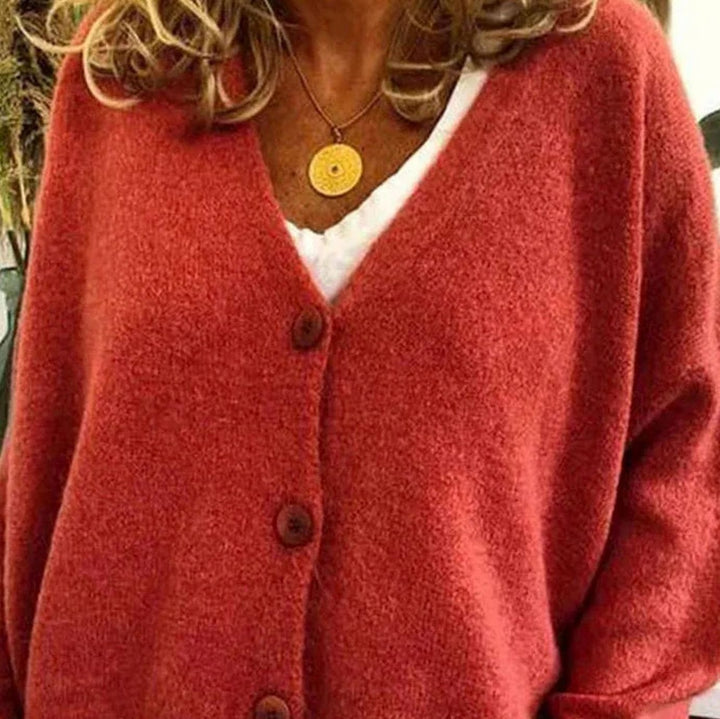 Cárdigan largo de punto mujer, cuello V y botones. Estilo casual elegante. Ideal para el frío.