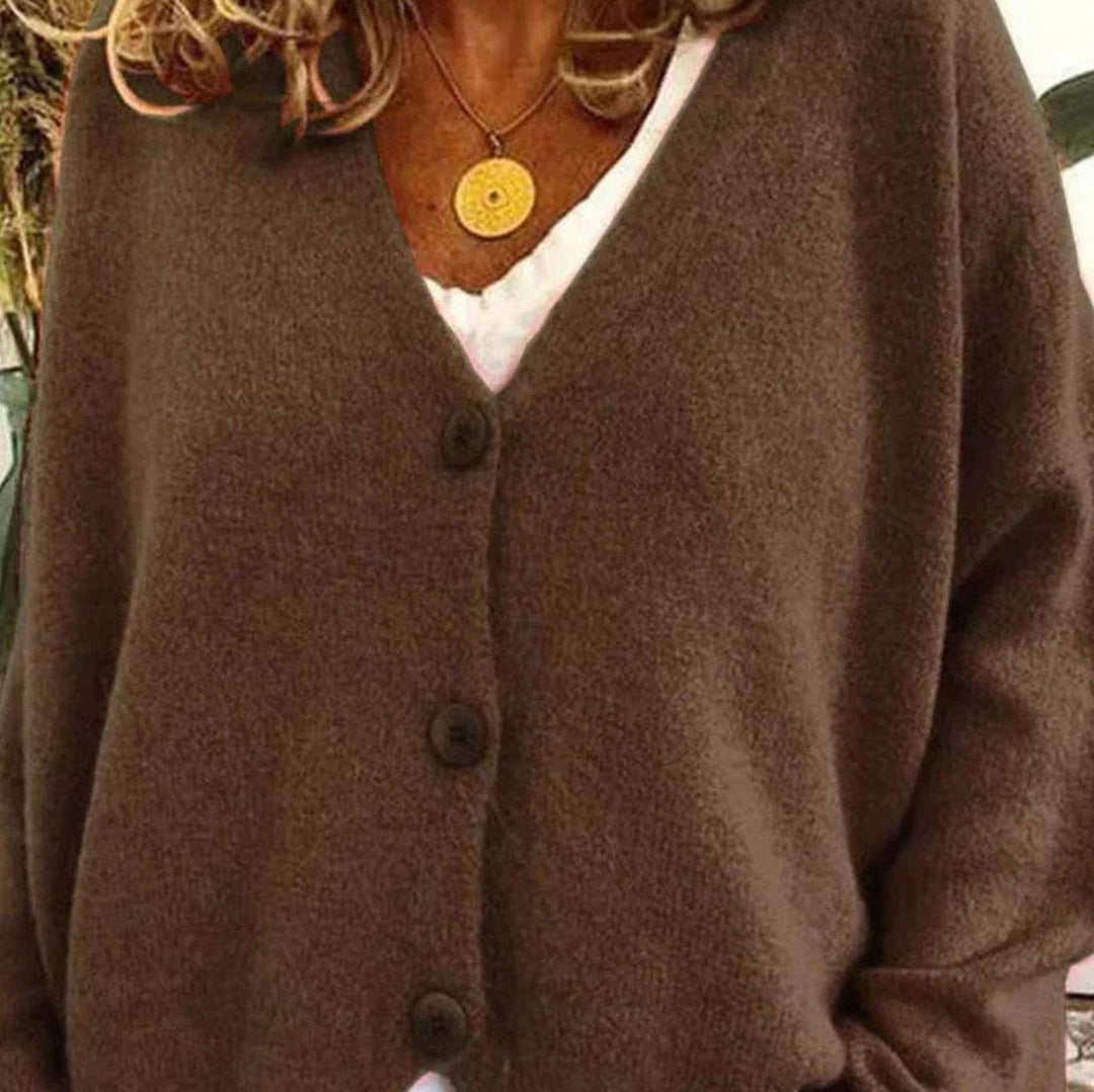 Cárdigan suave mujer, ajuste holgado, cuello V, botones. Perfecto para looks relajados y chic.
