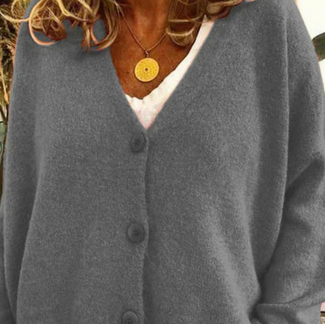 Cárdigan versátil mujer, color beige, holgado, con botones. Perfecto para combinar en otoño.
