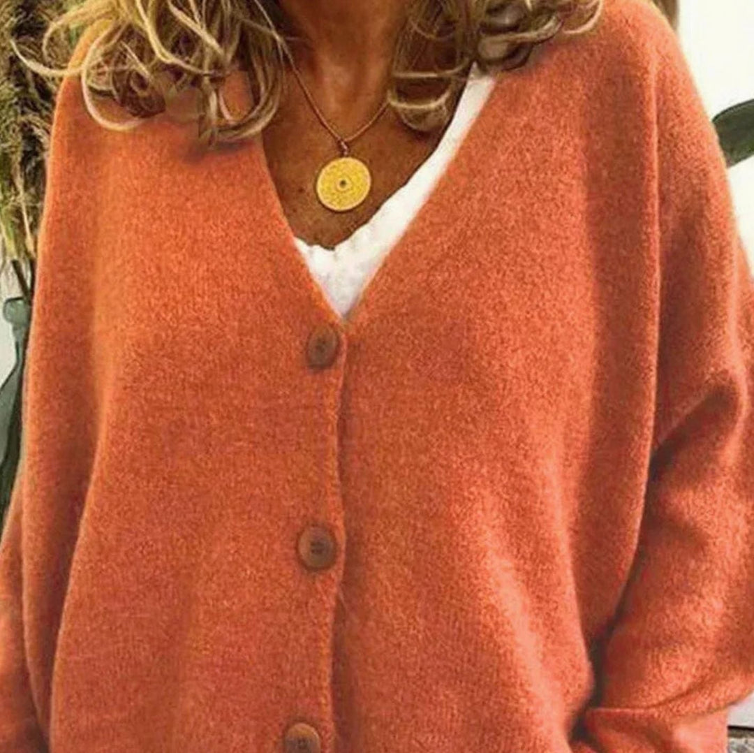 Cárdigan de punto para mujer, cuello V, botones. Diseño holgado que brinda comodidad y estilo casual.