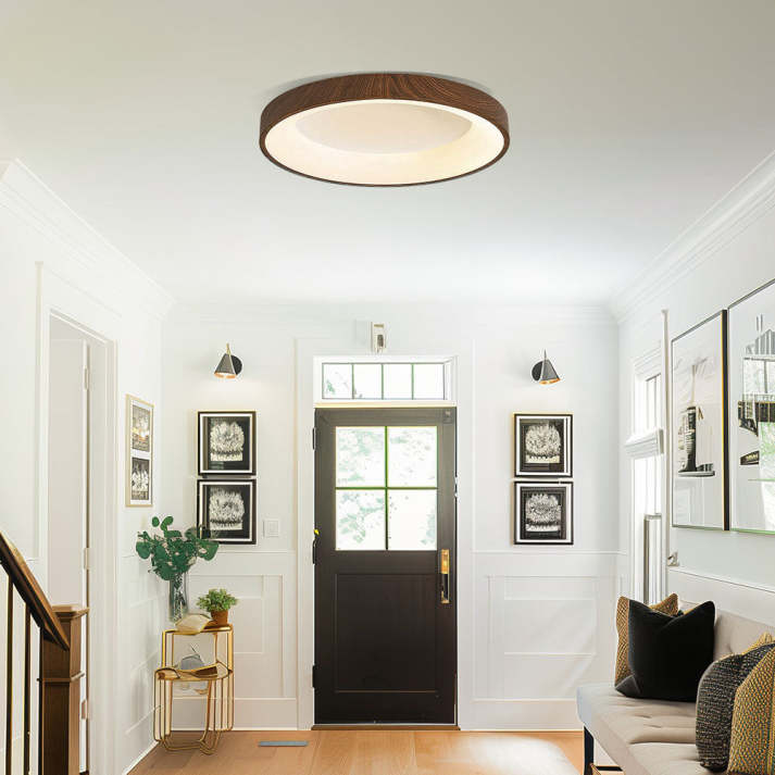Luz moderna de techo LED circular, madera natural. Eficiencia energética para un hogar contemporáneo.