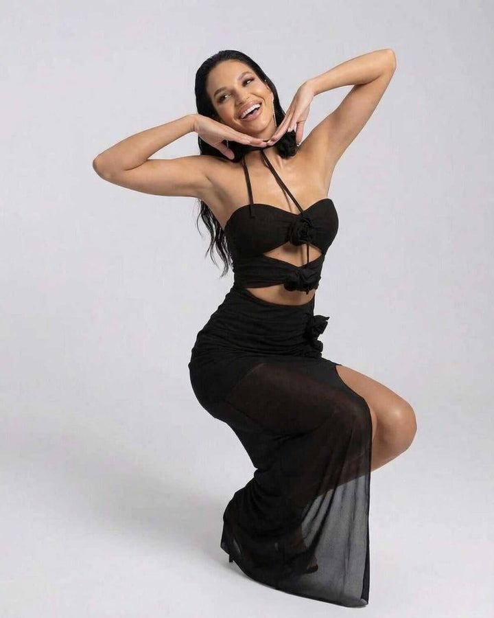 Vestido negro de noche para mujer, diseño maxi halter, que ofrece un look formal y elegante. Ideal para ocasiones especiales.