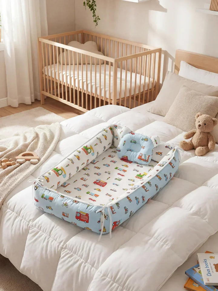 Accesorio bebé: Nido extralargo con cojín cervical de algodón natural para soporte y descanso infantil.