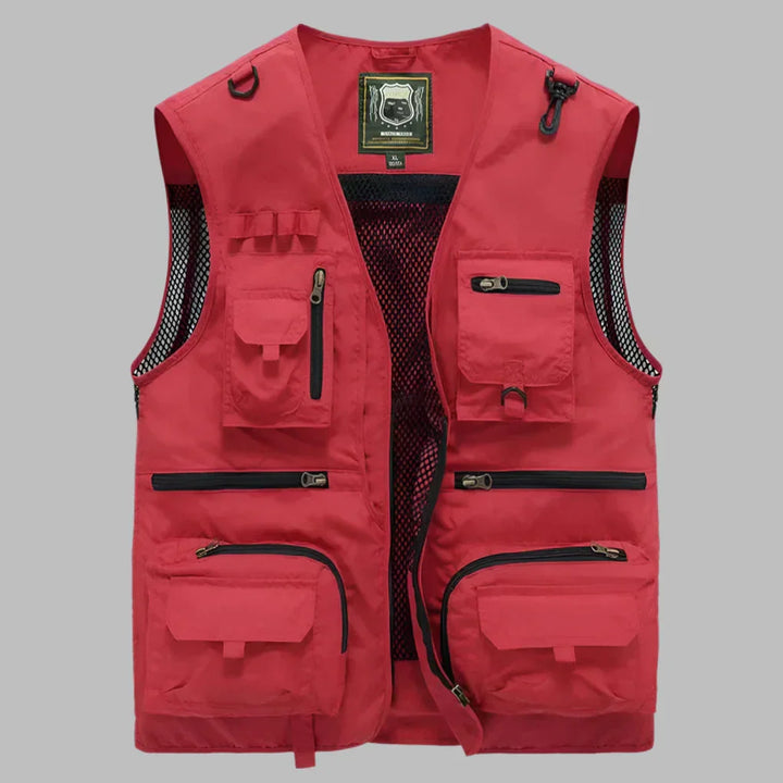 Chaleco multibolsillos de hombre, ideal para senderismo, pesca y aventura. Ropa exterior utilitaria y cómoda.