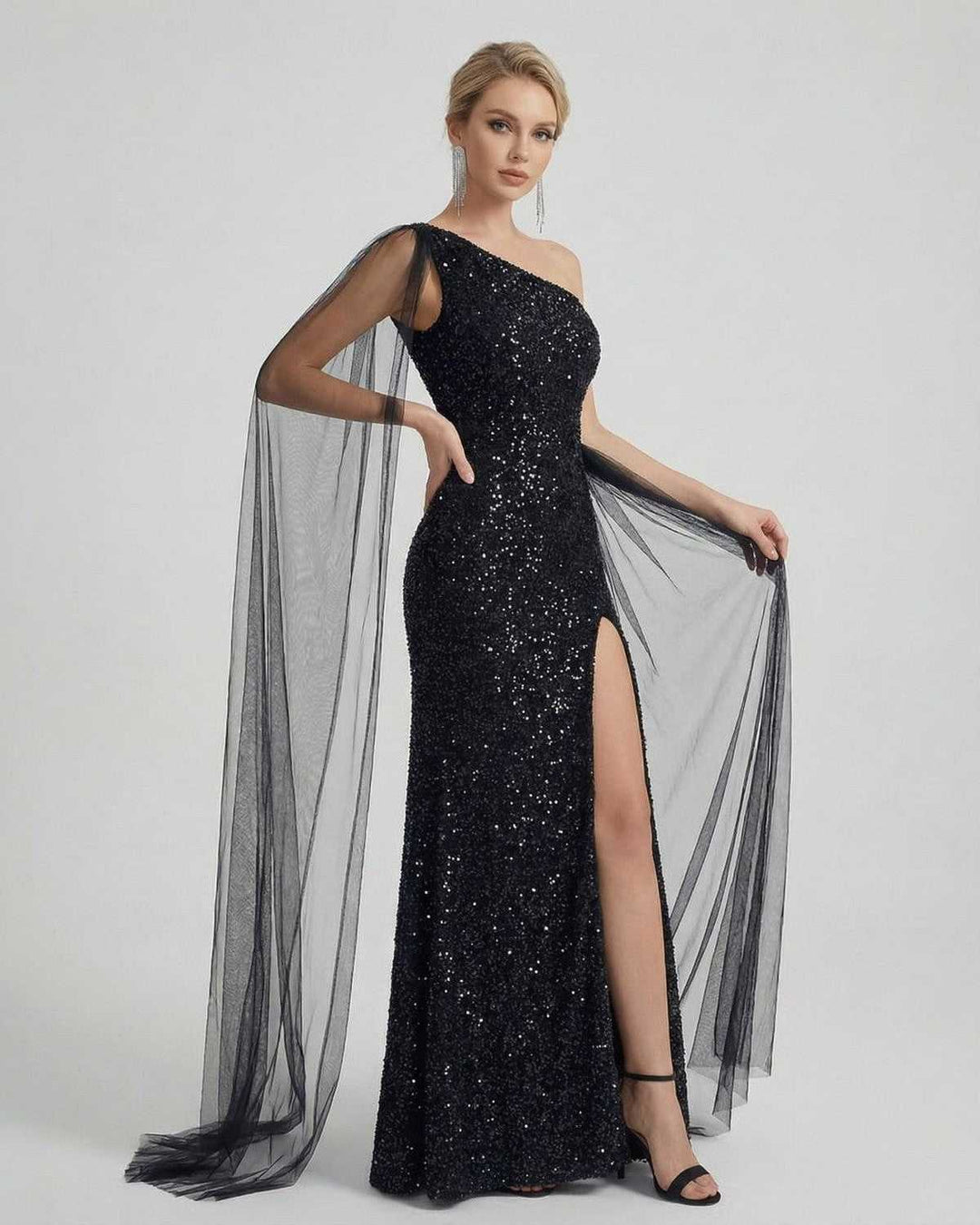 Detalle de lentejuelas brillantes en vestido maxi de noche para mujer, con sofisticado corte de hombro único.