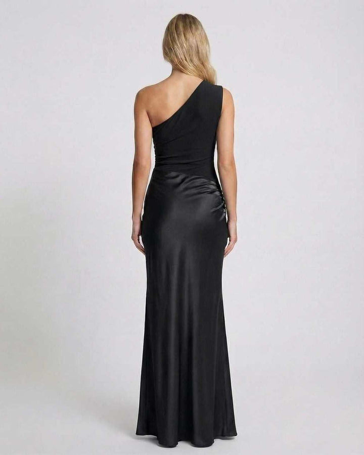 Vestido de un hombro negro asimétrico para mujer. Estilo largo, formal y sofisticado para ropa de noche.
