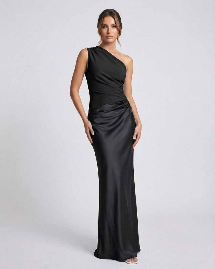 Vestido maxi negro elegante de un hombro para mujer. Ideal para fiestas y eventos formales.