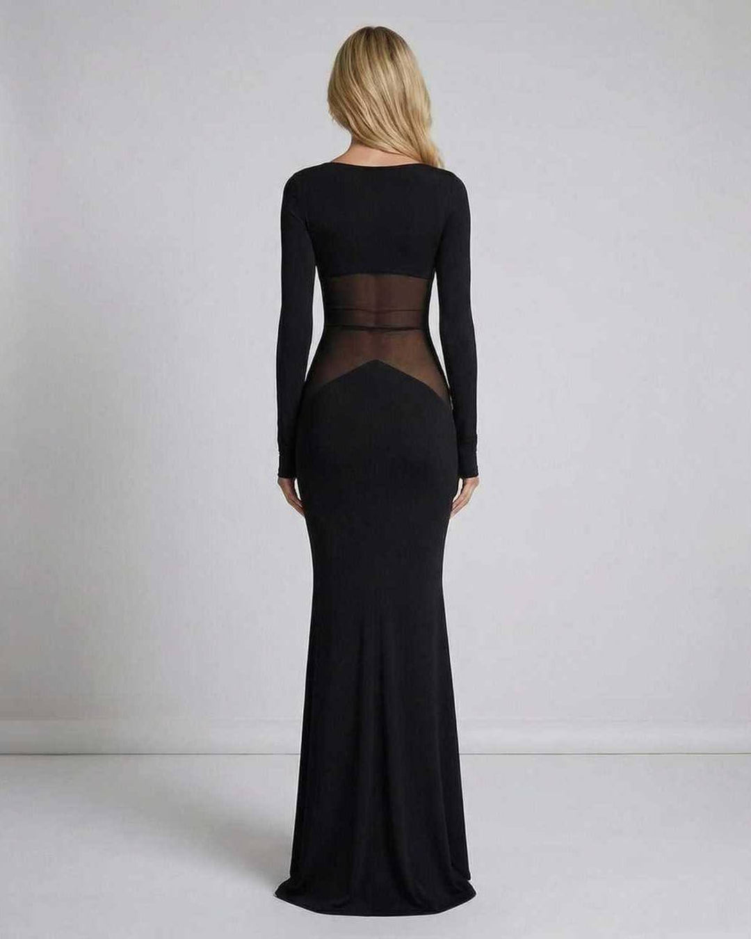 Vestido de noche maxi negro para mujer. Elegante diseño formal con malla transparente y manga larga. Perfecto para fiesta.