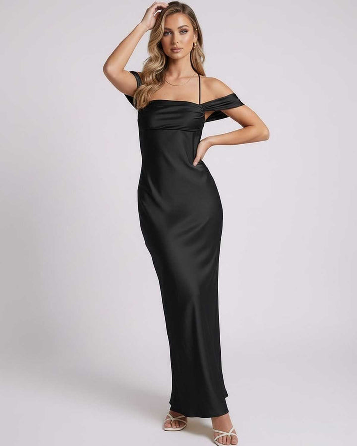 Moda mujer: Vestido maxi negro elegante con silueta ajustada. Ideal para noche, fiesta o evento formal. Hombros descubiertos.