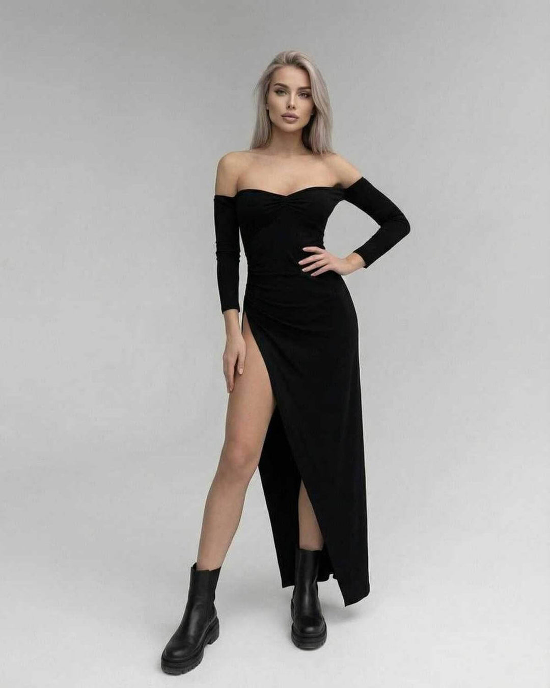 Vestido maxi negro elegante para mujer, ideal para noche, fiesta o cóctel. Diseño sofisticado de hombros descubiertos.