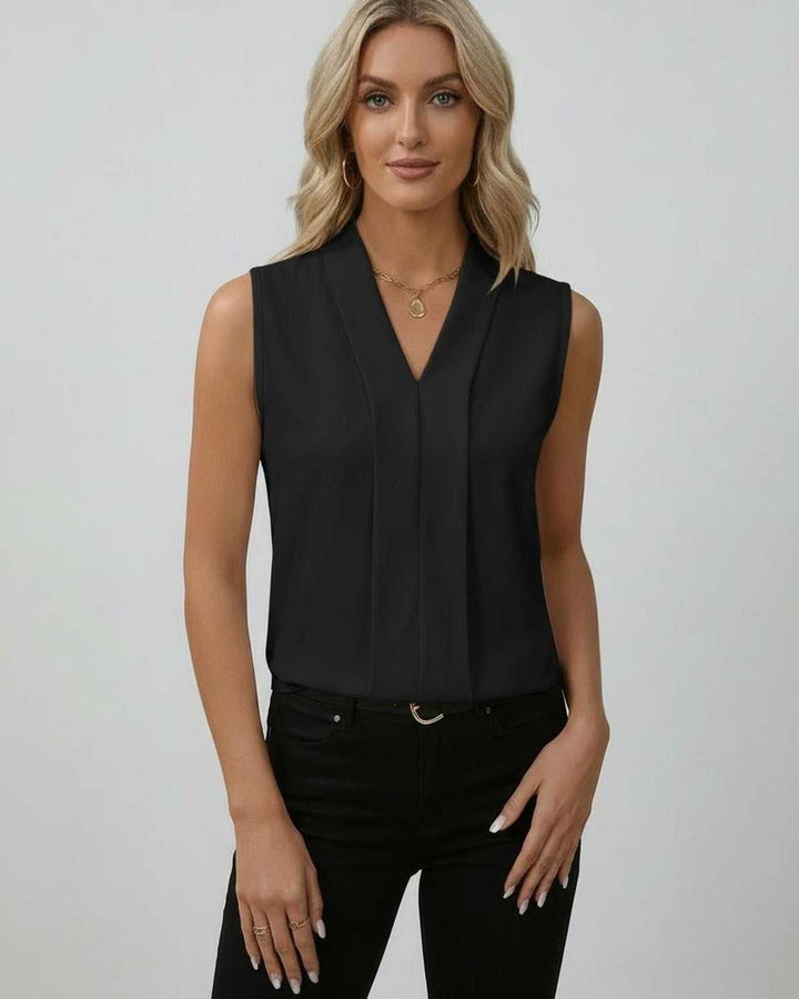 Top negro elegante de mujer sin mangas y escote en V. Ideal para looks casuales, de oficina o fiesta de verano.