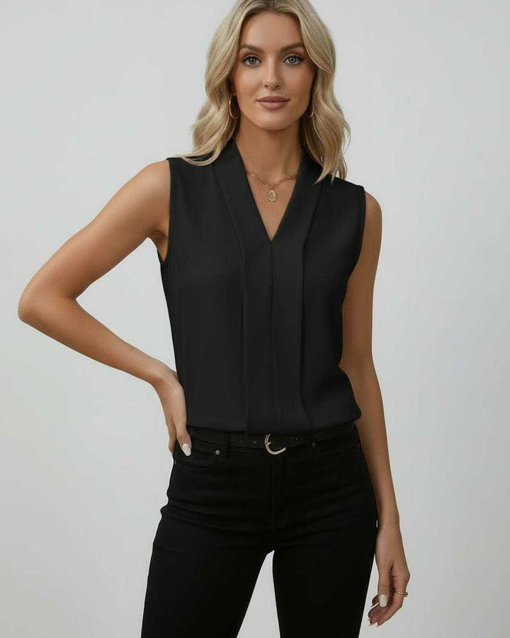 Moda mujer: Top negro elegante sin mangas con escote en V. Perfecto para un estilo sofisticado en primavera-verano.