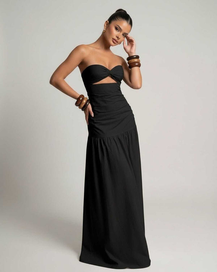 Vestido de noche maxi negro para mujer. Diseño sin tirantes y cintura alta, un corte elegante y moderno.