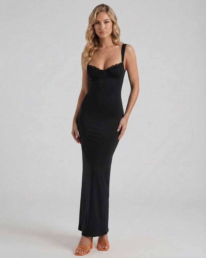 Vestido maxi elegante negro para mujer, ideal para noche o fiesta. Silueta recta y fluida.