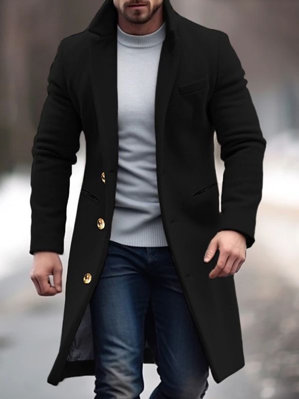 Abrigo de lana gris de cuello alto para hombre. Prenda invernal sofisticada y confortable para moda masculina.