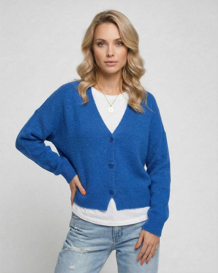 Cárdigan azul para mujer, ropa de abrigo ligera y cómoda. Estilo moderno, ideal para looks casuales y elegantes.