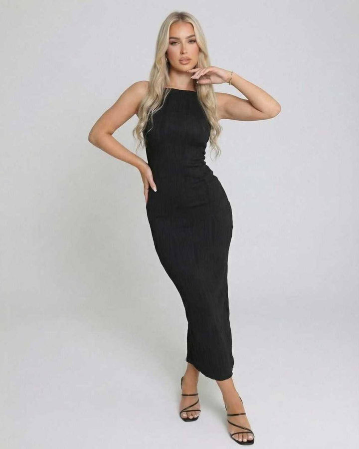 Elegante vestido midi blanco Nova para mujer, un estilo sofisticado sin mangas. Moda femenina chic y moderna.