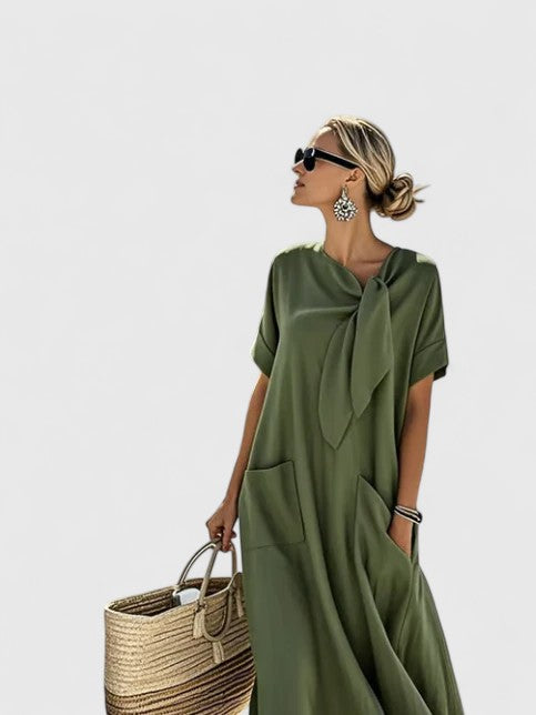 Vestido largo de mujer con lazo, un diseño fluido y cómodo. Ideal para un estilo elegante y sofisticado.
