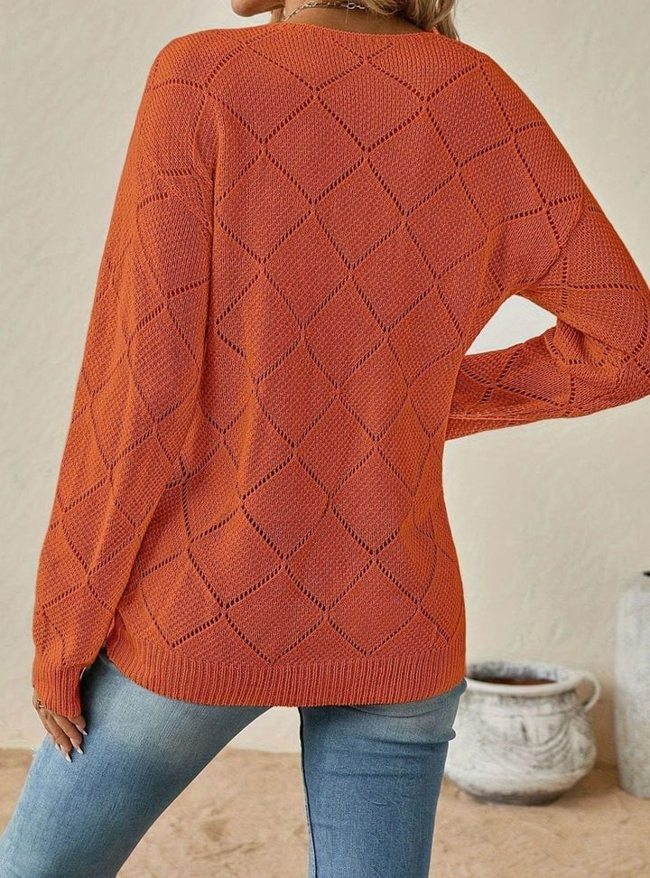 Jersey calado de punto con manga larga elegante para mujer. Escote en V, moda y estilo versátil.