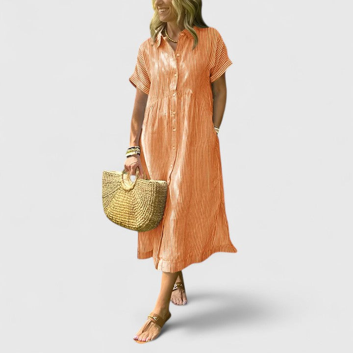Vestido camisero elegante de rayas para mujer, look fresco y moderno. Prenda versátil de moda.