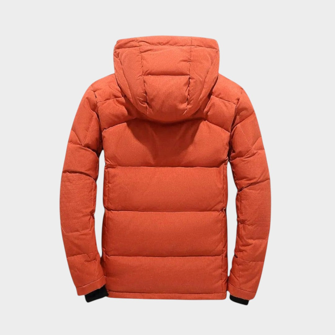 Abrigo parka masculino aislante y resistente al agua, perfecto para protegerse del frío extremo en invierno.