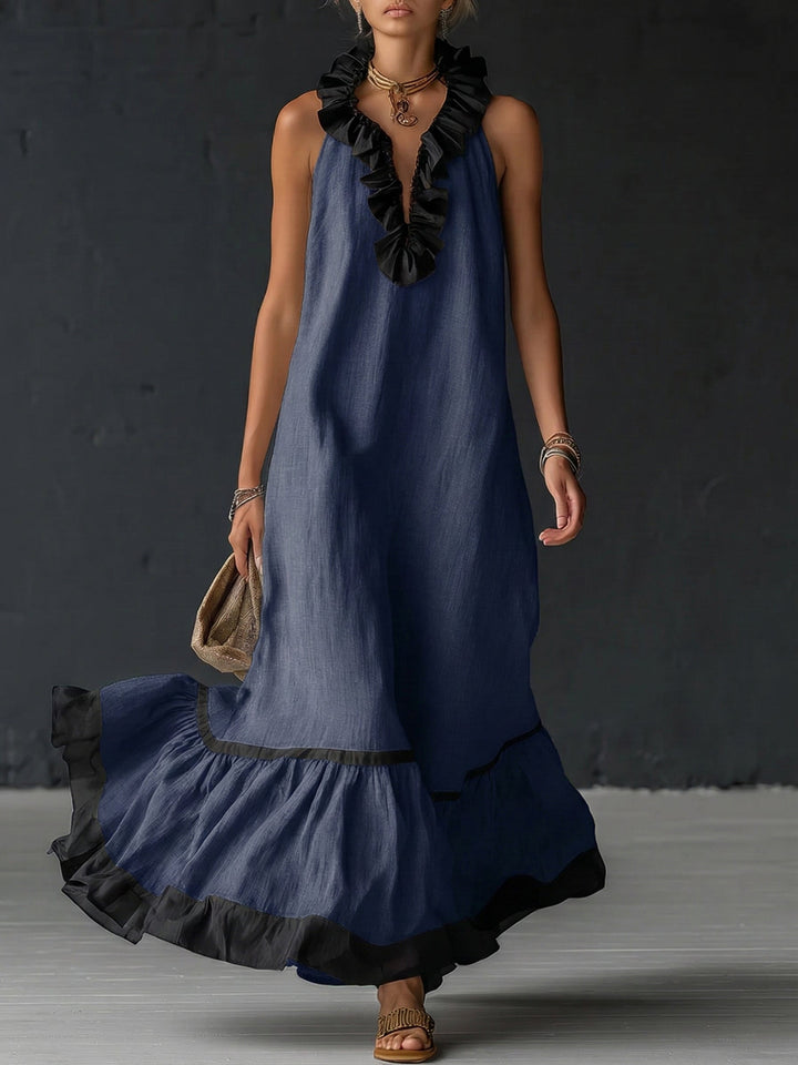 Mujer vistiendo vestido maxi boho bicolor con volantes, look casual de verano, cómodo y chic. Perfecta para el día.