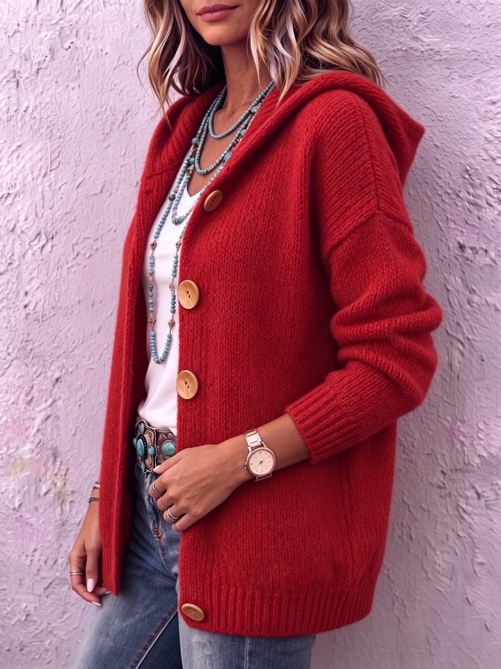 Suéter cárdigan de punto con capucha para mujer, brindando comodidad y calidez en la ropa femenina de invierno.