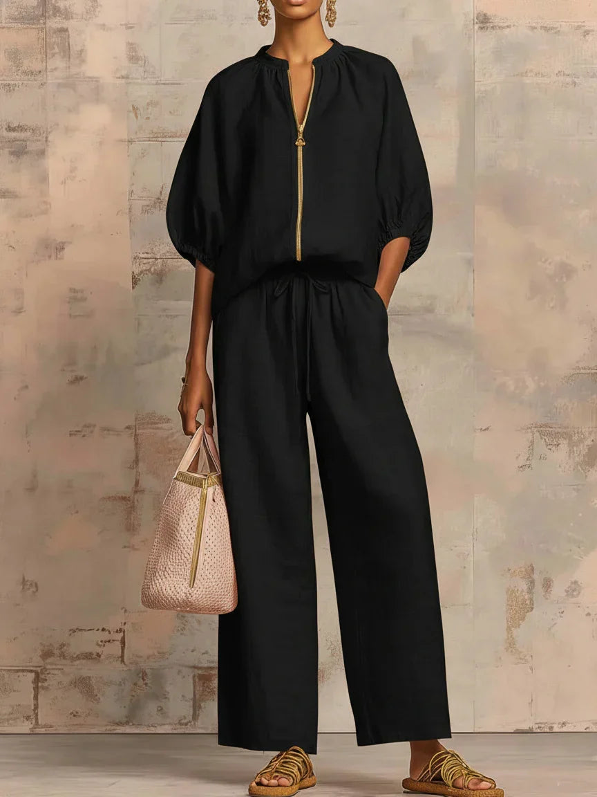 Elegante conjunto de mujer con camisa y pantalón ancho. Estilo versátil para verano y ocasiones casuales.