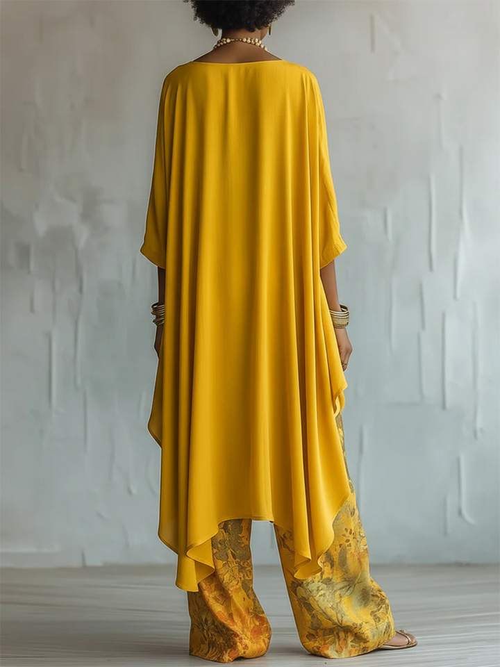 Ropa de verano casual chic: conjunto bohemio de dos piezas con blusa asimétrica y pantalón floral para mujer.