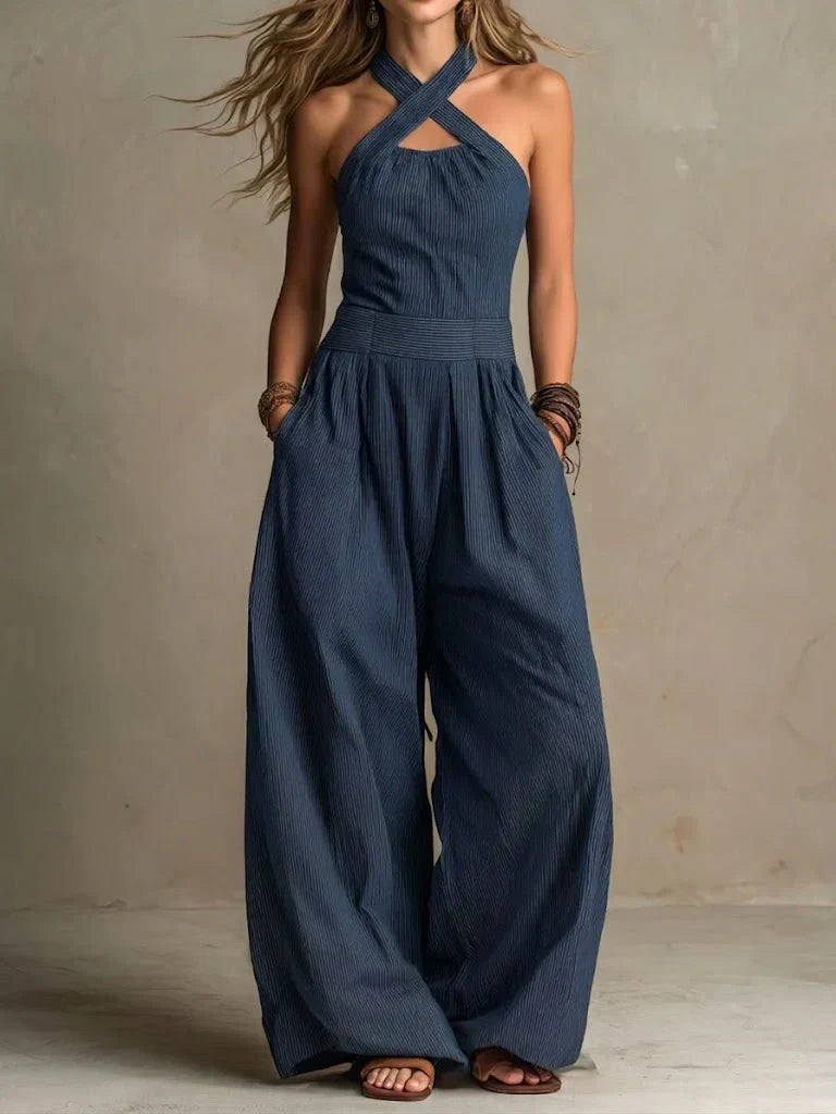 Mono mujer elegante cruzado sin mangas, pierna ancha fluida. Perfecto para fiestas de verano y moda casual chic.