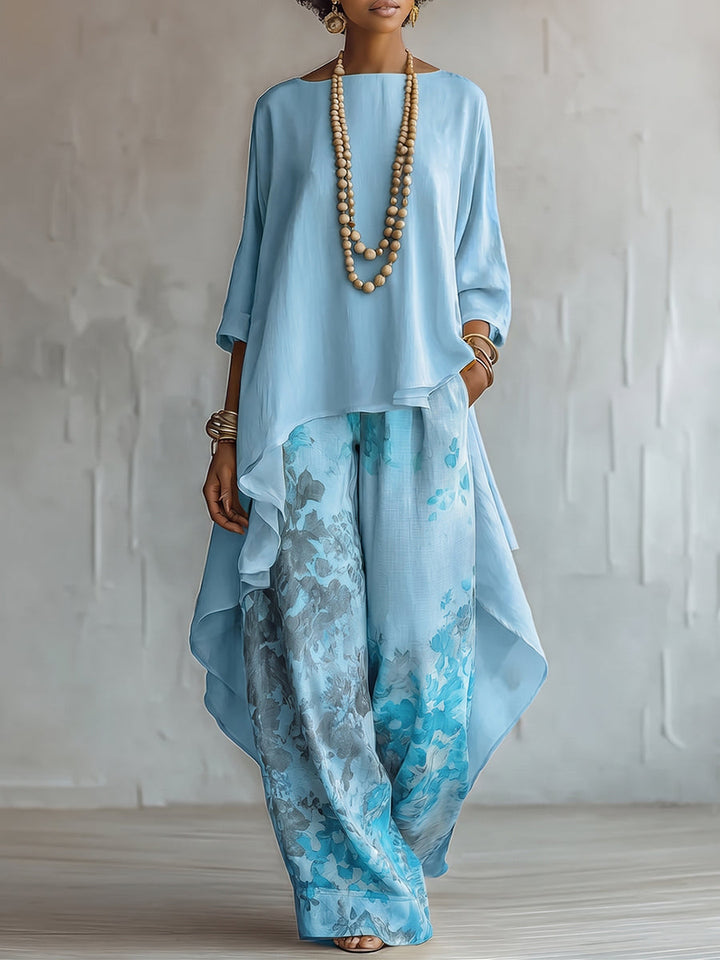 Conjunto dos piezas mujer bohemio: blusa asimétrica y pantalón fluido con estampado floral, ideal para vacaciones.