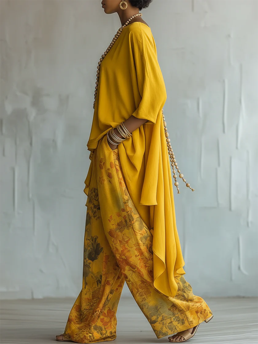 Conjunto de mujer fluido y bohemio: blusa asimétrica y pantalón estampado floral, cómodo para ropa de verano.
